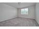 Bedroom has natural light coming in from a large window at 17363 Million Lakes Ct, Clermont, FL 34714