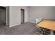 Bedroom with a closet and a table set up for working at 17363 Million Lakes Ct, Clermont, FL 34714