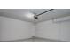 A large garage offers ample space for parking and storage at 17363 Million Lakes Ct, Clermont, FL 34714
