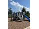 Community playground with slide, climbing area, and playful seaside design at 17363 Million Lakes Ct, Clermont, FL 34714