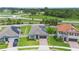 Aerial view of houses, lawns, and solar panels at 1740 Standing Rock Cir, Oakland, FL 34787