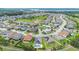 Aerial view of a residential neighborhood with community amenities at 1740 Standing Rock Cir, Oakland, FL 34787