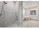 Luxurious bathroom boasts a glass enclosed shower and soaking tub at 1740 Standing Rock Cir, Oakland, FL 34787