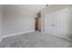 Cozy bedroom with plush carpeting and neutral-toned walls at 1740 Standing Rock Cir, Oakland, FL 34787
