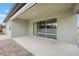 Covered patio with sliding glass doors overlooking the sparkling swimming pool at 1740 Standing Rock Cir, Oakland, FL 34787