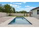 Beautiful backyard pool with travertine and brick-paved deck, offering a luxurious outdoor retreat at 1740 Standing Rock Cir, Oakland, FL 34787