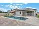 A swimming pool and solar panels are visible on the rear of the house at 1740 Standing Rock Cir, Oakland, FL 34787