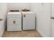 Convenient laundry area features a modern washer and dryer at 1797 Archer Dr, Minneola, FL 34715
