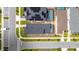 Birds-eye view showcasing the property's location within a modern, well-maintained neighborhood with pools and solar panels at 1809 Tropical Palms Cir, Kissimmee, FL 34747