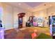 Exciting arcade room with various gaming machines and colorful decor, perfect for entertainment at 1809 Tropical Palms Cir, Kissimmee, FL 34747