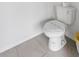 Bathroom features standard toilet with toilet paper at 1809 Tropical Palms Cir, Kissimmee, FL 34747