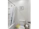 Bathroom featuring tub/shower combination, toilet, and wall art at 1809 Tropical Palms Cir, Kissimmee, FL 34747
