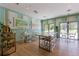 Charming cafe area with comfortable seating, stylish decor, and ample natural light for a pleasant experience at 1809 Tropical Palms Cir, Kissimmee, FL 34747