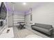 Converted garage space with TV, sofa, and pool table at 1809 Tropical Palms Cir, Kissimmee, FL 34747