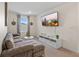 Cozy living room with comfortable seating and a large screen television at 1809 Tropical Palms Cir, Kissimmee, FL 34747