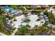 View of community splashpad, featuring shaded seating and lush landscaping at 1809 Tropical Palms Cir, Kissimmee, FL 34747