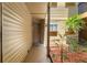 Private condo entrance featuring neutral colors and a decorative mulch bed at 1908 Lake Atriums Cir # 3, Orlando, FL 32839