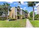 Well-maintained condo complex with manicured landscaping and vibrant green spaces at 1908 Lake Atriums Cir # 3, Orlando, FL 32839
