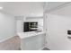 Efficient kitchen with an eat-in counter and modern appliances at 1908 Lake Atriums Cir # 3, Orlando, FL 32839