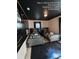 Whimsical bedroom with space-themed decor, two beds, and a cool black ceiling at 226 Canna Dr, Davenport, FL 33897