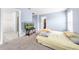 Bedroom with soft blue walls, plush carpeting, and easy access to closet and bathroom at 236 Miles Ct, Davenport, FL 33837