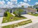 Attractive single-story home featuring a manicured lawn and a two-car garage, set in a tranquil residential neighborhood at 236 Miles Ct, Davenport, FL 33837
