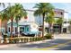 Street view showing the Margaritaville Resort Orlando with palm trees, blue and white building and a sling shot car at 2923 Castaway Ln, Kissimmee, FL 34747