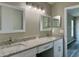 Elegant bathroom featuring double sinks and granite countertops at 307 Dalton Ct, Davenport, FL 33897