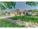 Charming single-story home featuring an attached two-car garage and neutral stucco exterior at 324 Sir Lawrence Dr, Sanford, FL 32773