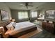 Light-filled bedroom boasts a large bed, mirrored closet, and stylish decor at 3270 S Semoran Blvd # 15, Orlando, FL 32822