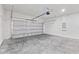 Clean and spacious garage with a modern door, offering ample space for parking and storage at 3749 Sw 131St St, Ocala, FL 34473