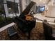 A grand piano sits as a centerpiece in this luxury condo's community space at 400 E Colonial Dr # 910, Orlando, FL 32803