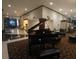 Grand piano in the lobby, complemented by modern seating and elegant decor at 400 E Colonial Dr # 910, Orlando, FL 32803