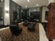 Beautiful lobby showcasing a piano, sitting area and luxurious flooring at 400 E Colonial Dr # 910, Orlando, FL 32803