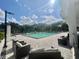 Outdoor pool with comfortable lounge seating and ample space for relaxation and recreation at 400 E Colonial Dr # 910, Orlando, FL 32803