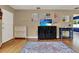 Open-concept living area with hardwood floors, ample lighting, and stylish furnishings at 4015 Ibis Dr, Orlando, FL 32803