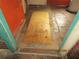 Plywood floor with evidence of water damage needing replacement at 4231 Raleigh St, Orlando, FL 32811