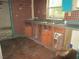 A kitchen with outdated features and worn cabinets at 4231 Raleigh St, Orlando, FL 32811