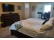 Comfortable bedroom with an en-suite home office with plantation shutters at 4351 Winding Oaks Cir, Mulberry, FL 33860