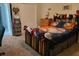Baseball-themed bedroom with carpet flooring, baseball-themed decor, and baseball bats at 4351 Winding Oaks Cir, Mulberry, FL 33860