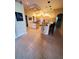 Expansive eat-in kitchen featuring a center island, tile flooring, and ample counter seating at 4351 Winding Oaks Cir, Mulberry, FL 33860