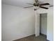 Bedroom featuring a ceiling fan, closet, and neutral carpeting at 436 Hammerstone Ave, Haines City, FL 33844