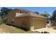Two-story home with an attached two-car garage and bright exterior at 436 Hammerstone Ave, Haines City, FL 33844