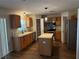Well-equipped kitchen featuring stainless steel appliances, island and ample cabinet space at 436 Hammerstone Ave, Haines City, FL 33844
