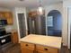 The kitchen features stainless appliances, a center island and lots of cabinet space at 436 Hammerstone Ave, Haines City, FL 33844