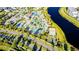 An aerial view of the community's luxurious resort-style pool, playground, and water features at 4530 Narrative Ln, Kissimmee, FL 34746