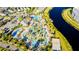 Aerial view of waterpark with pools, waterslides, mini golf, sand volleyball and lazy river at 4530 Narrative Ln, Kissimmee, FL 34746