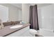 Elegant bathroom with a modern vanity, sink, and neutral color palette at 4530 Narrative Ln, Kissimmee, FL 34746