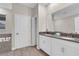 Bathroom featuring a double vanity with gray countertop and tiled flooring at 4530 Narrative Ln, Kissimmee, FL 34746