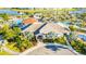 Aerial view of the clubhouse and common areas, including pool and water features at 4530 Narrative Ln, Kissimmee, FL 34746